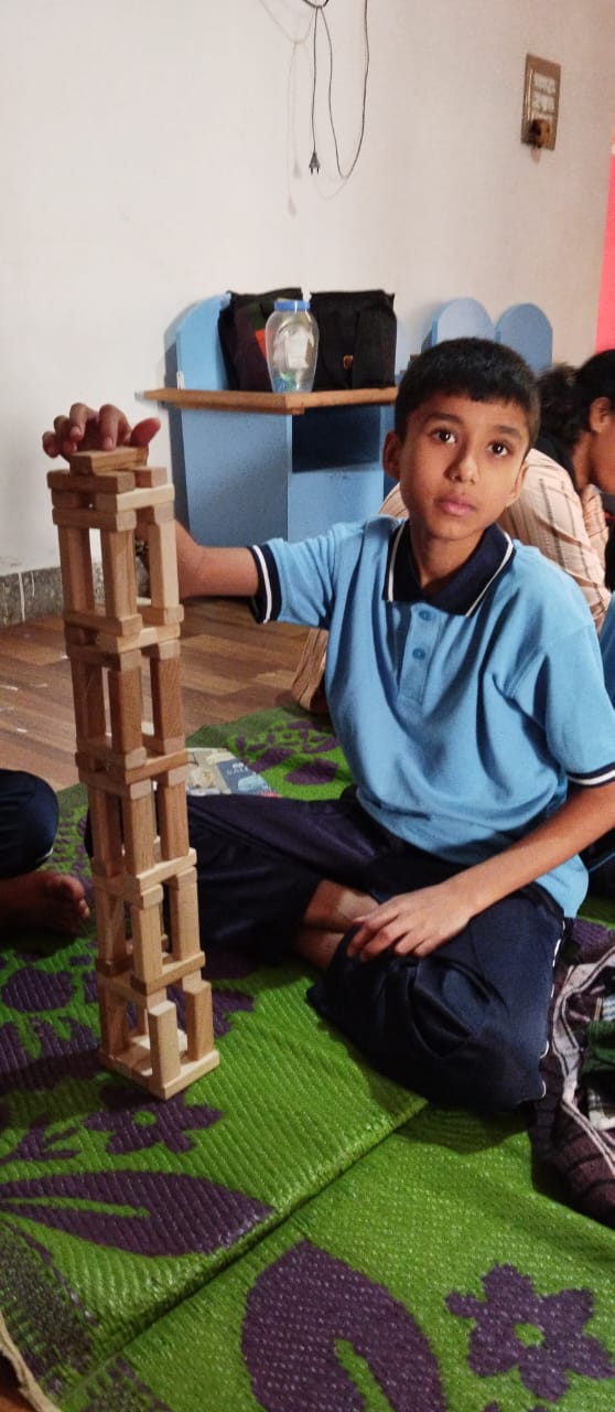 Building a tower — fine motor practice